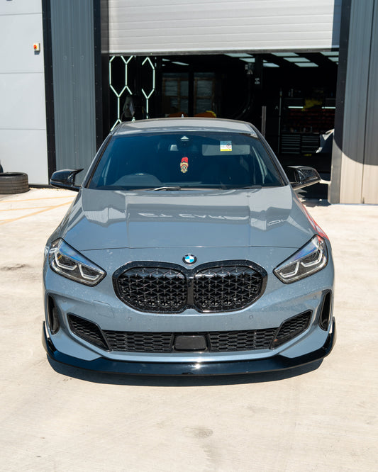 BMW F40 1 SERIES GLOSS BLACK SPLITTER - MP STYLE-Splitter-BLAK BY CT-CT Carbon - High-quality carbon fiber and gloss black aerodynamic parts for premium sports and luxury vehicles.