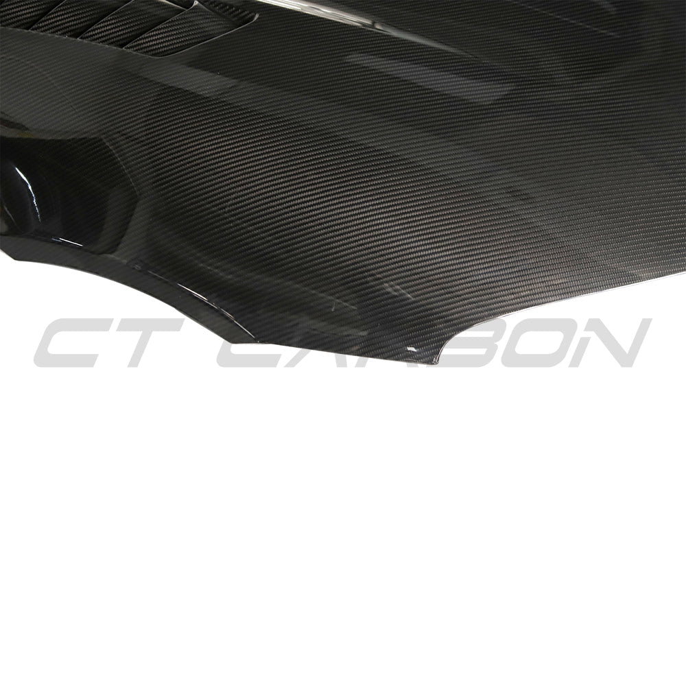 TOYOTA SUPRA 2019+ A90 CARBON FIBRE FRONT HOOD/BONNET-Bonnet-CT CARBON-CT Carbon - High-quality carbon fiber and gloss black aerodynamic parts for premium sports and luxury vehicles.