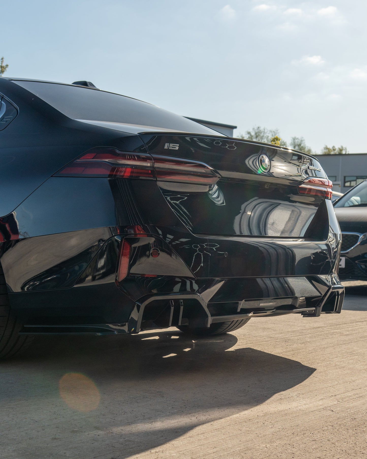 BMW 5 SERIES G60 & i5 2023+ GLOSS BLACK DIFFUSER-Diffuser-BLAK BY CT-CT Carbon - High-quality carbon fiber and gloss black aerodynamic parts for premium sports and luxury vehicles.