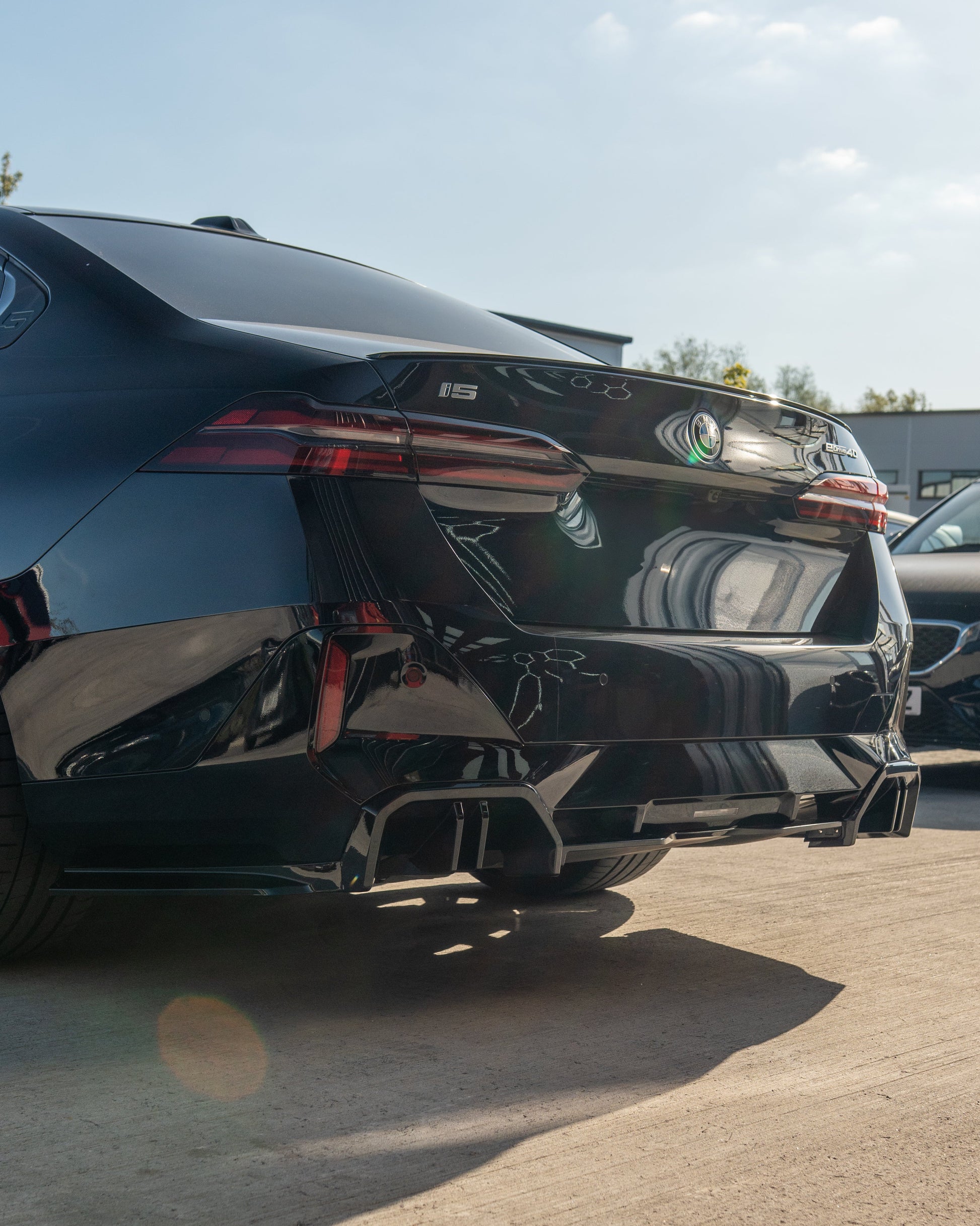 BMW 5 SERIES G60 & i5 2023+ GLOSS BLACK DIFFUSER-Diffuser-BLAK BY CT-CT Carbon - High-quality carbon fiber and gloss black aerodynamic parts for premium sports and luxury vehicles.