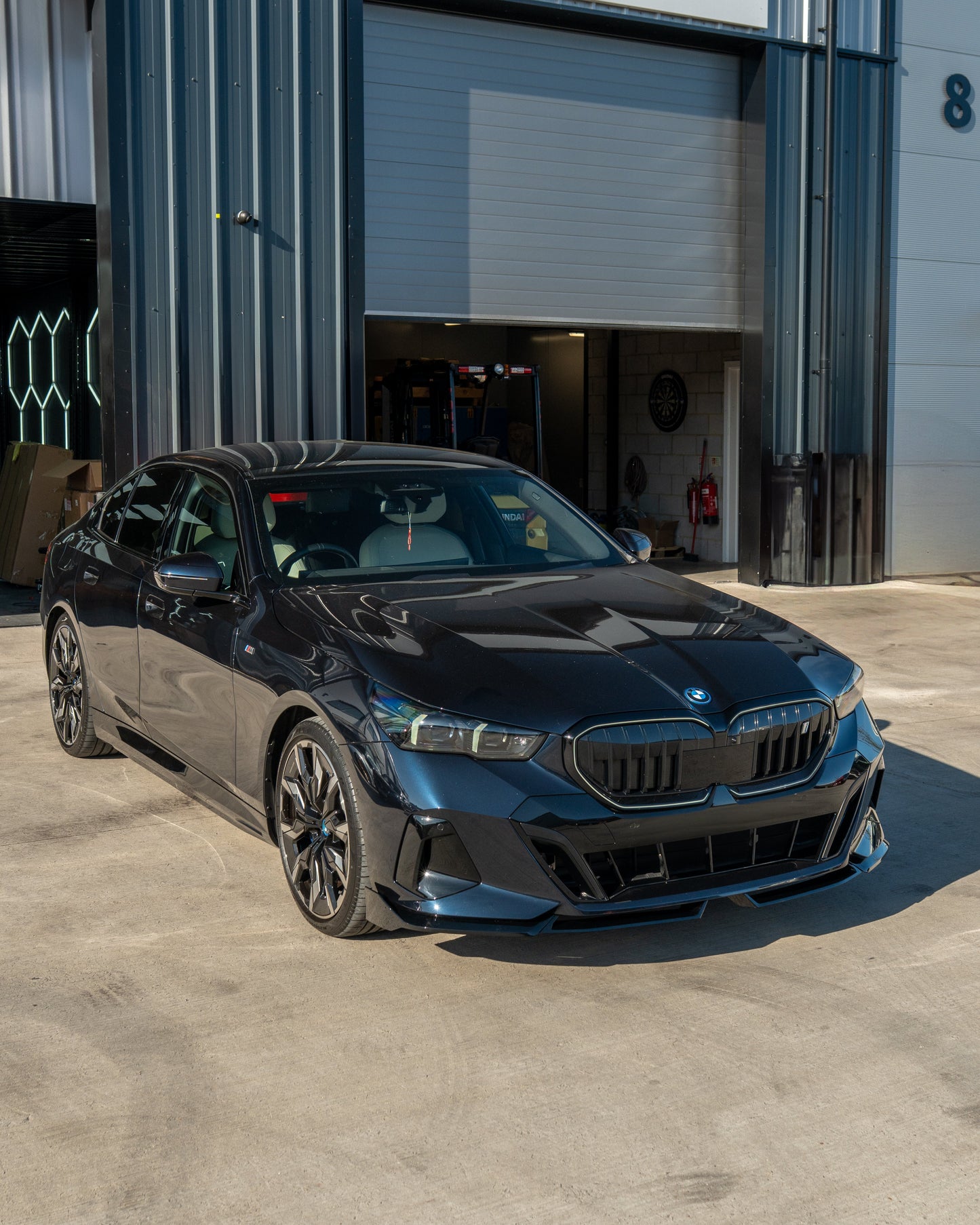 BMW 5 SERIES G60 & i5 2023+ GLOSS BLACK SPLITTER-Splitter-BLAK BY CT-CT Carbon - High-quality carbon fiber and gloss black aerodynamic parts for premium sports and luxury vehicles.