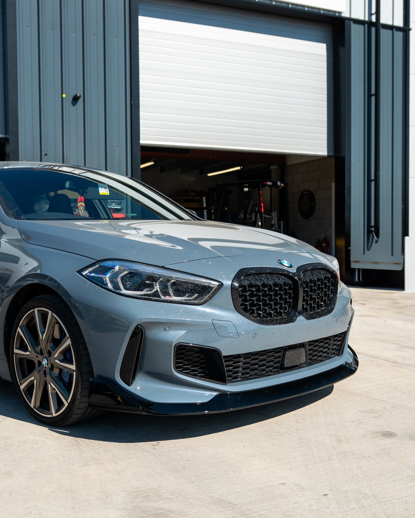 BMW F40 1 SERIES GLOSS BLACK SPLITTER - MP STYLE-Splitter-BLAK BY CT-CT Carbon - High-quality carbon fiber and gloss black aerodynamic parts for premium sports and luxury vehicles.