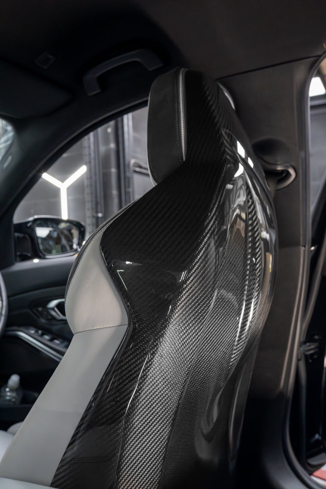 BMW GXX/F9X FULL CARBON FIBRE SEATS BACKS-Accessories-CT CARBON-CT Carbon - High-quality carbon fiber and gloss black aerodynamic parts for premium sports and luxury vehicles.