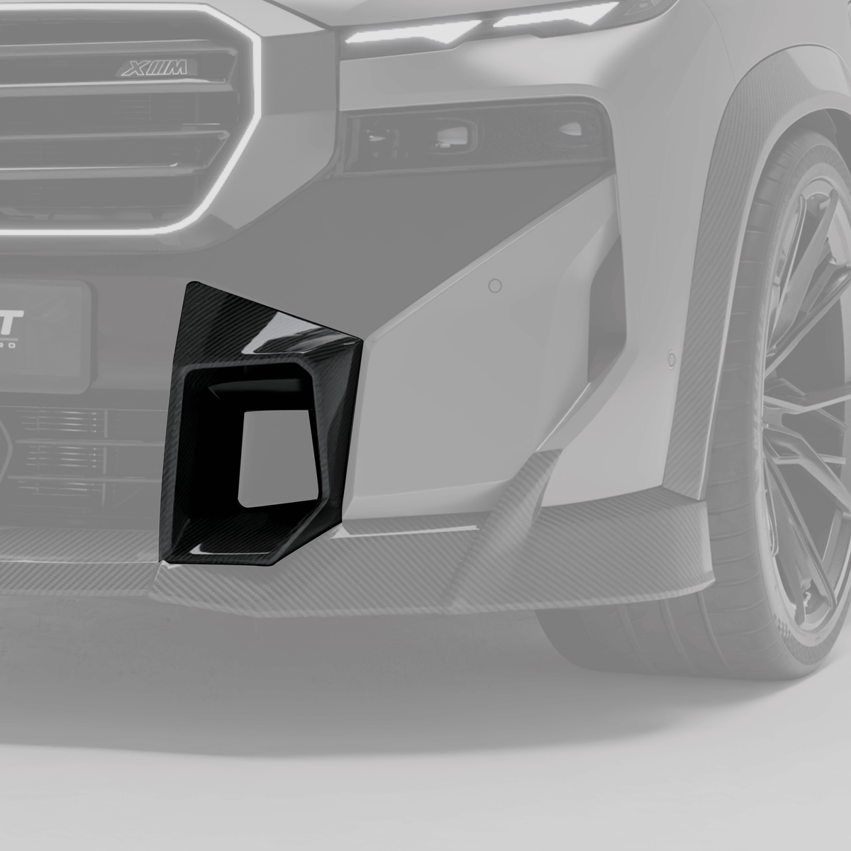 BMW XM G09 carbon fiber front bumper vent trims installed