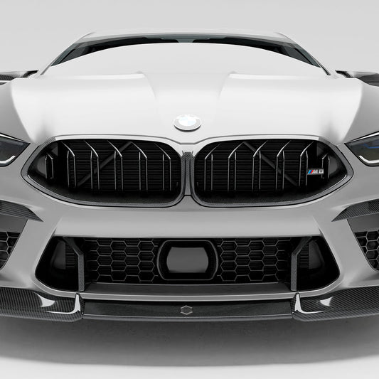 BMW M8 F92  with a carbon fiber griile close-up  on a white background