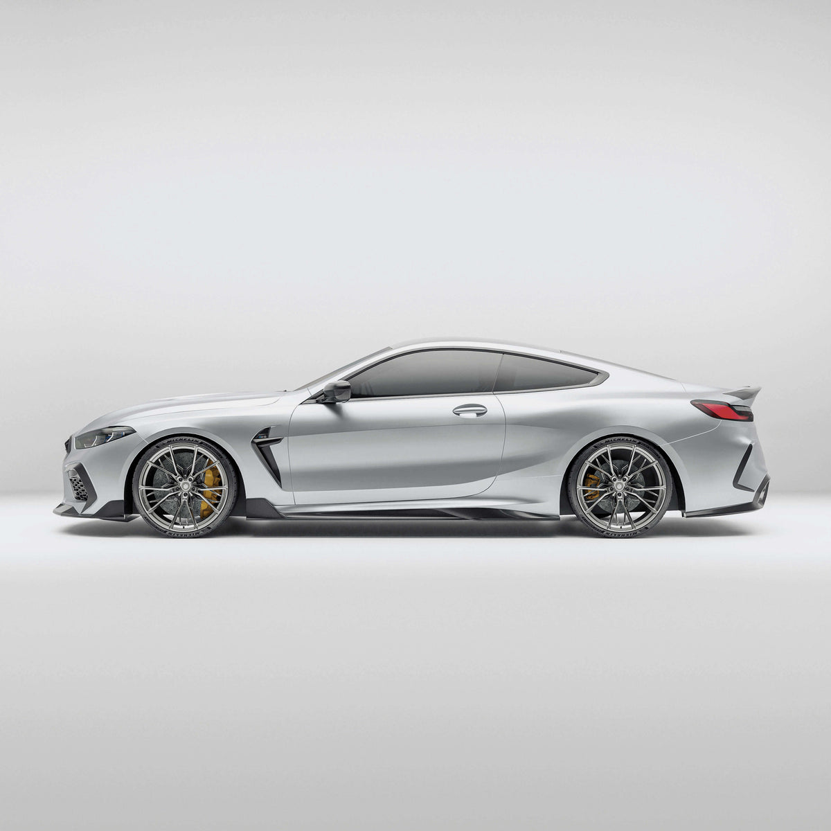 BMW M8 F92  with a carbon fiber side skirts full-view on a white background