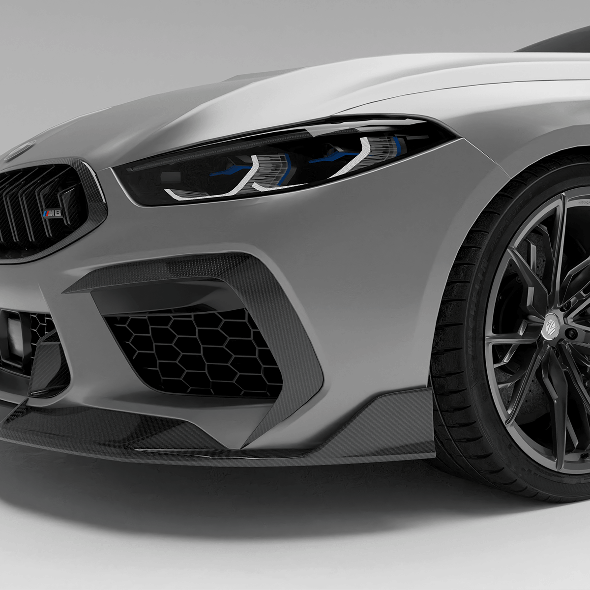 BMW M8 F92  with a carbon fiber canards on a white background