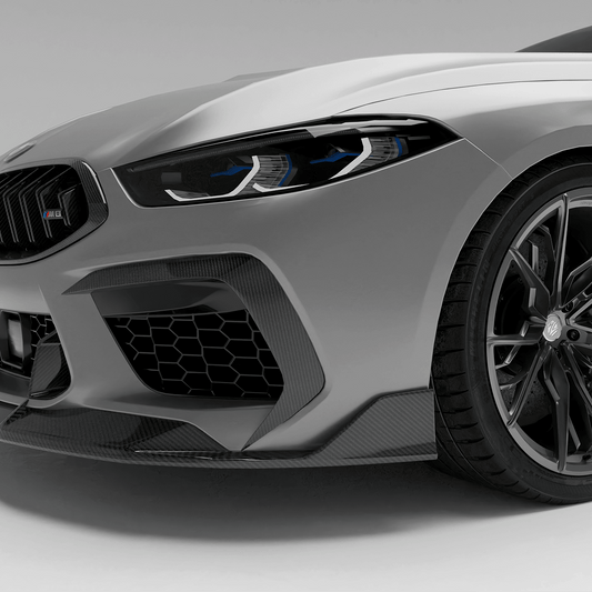 BMW M8 F92  with a carbon fiber canards on a white background