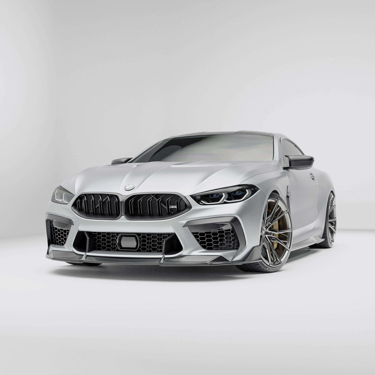 BMW M8 F92  with a carbon fiber front lip on a white background