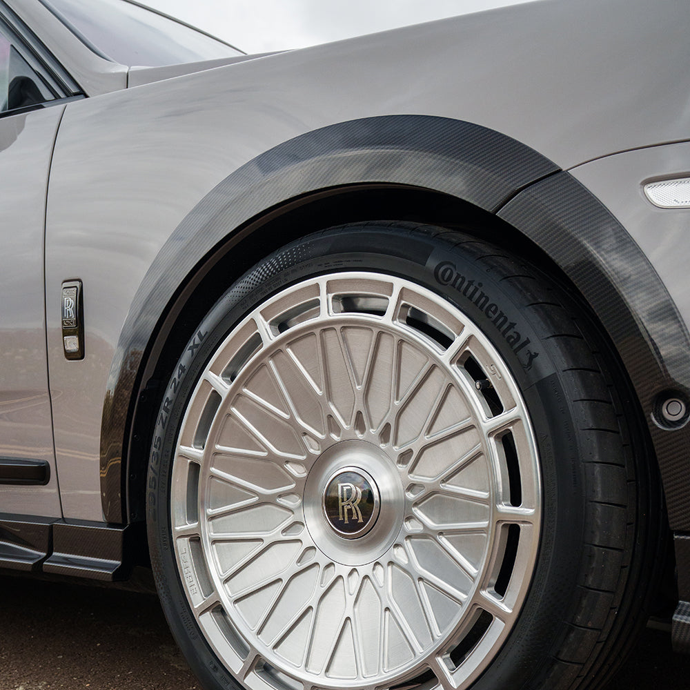 ROLLS ROYCE CULLINAN CARBON FIBRE WHEEL ARCH EXTENSIONS - CT DESIGN-Splitter-CT Carbon-CT Carbon - High-quality carbon fiber and gloss black aerodynamic parts for premium sports and luxury vehicles.