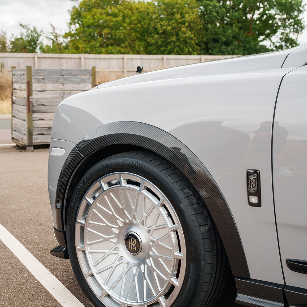 ROLLS ROYCE CULLINAN CARBON FIBRE WHEEL ARCH EXTENSIONS - CT DESIGN-Splitter-CT Carbon-CT Carbon - High-quality carbon fiber and gloss black aerodynamic parts for premium sports and luxury vehicles.