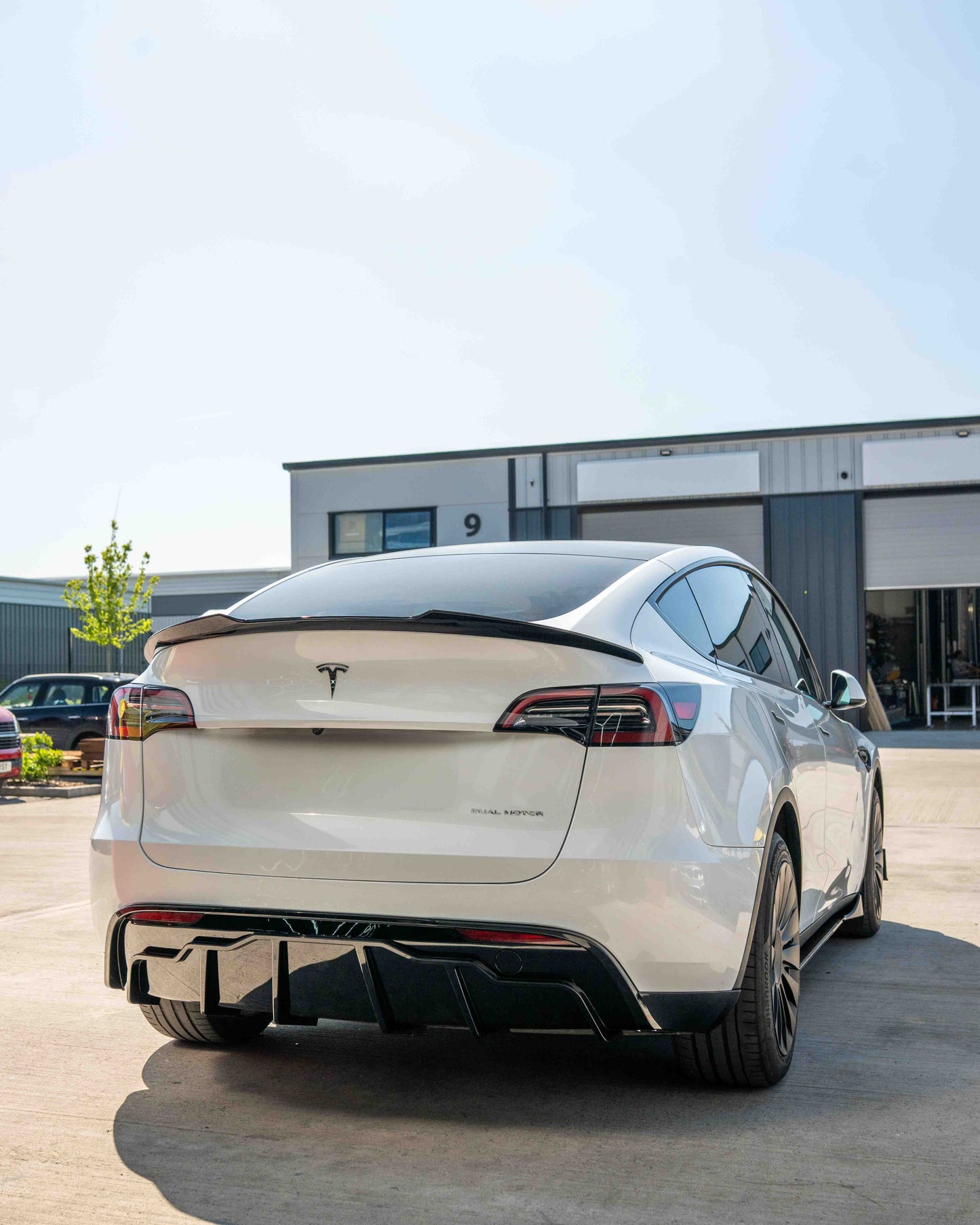TESLA MODEL Y FULL GLOSS BLACK KIT - BLAK BY CT CARBON-Kit-BLAK BY CT-CT Carbon - High-quality carbon fiber and gloss black aerodynamic parts for premium sports and luxury vehicles.