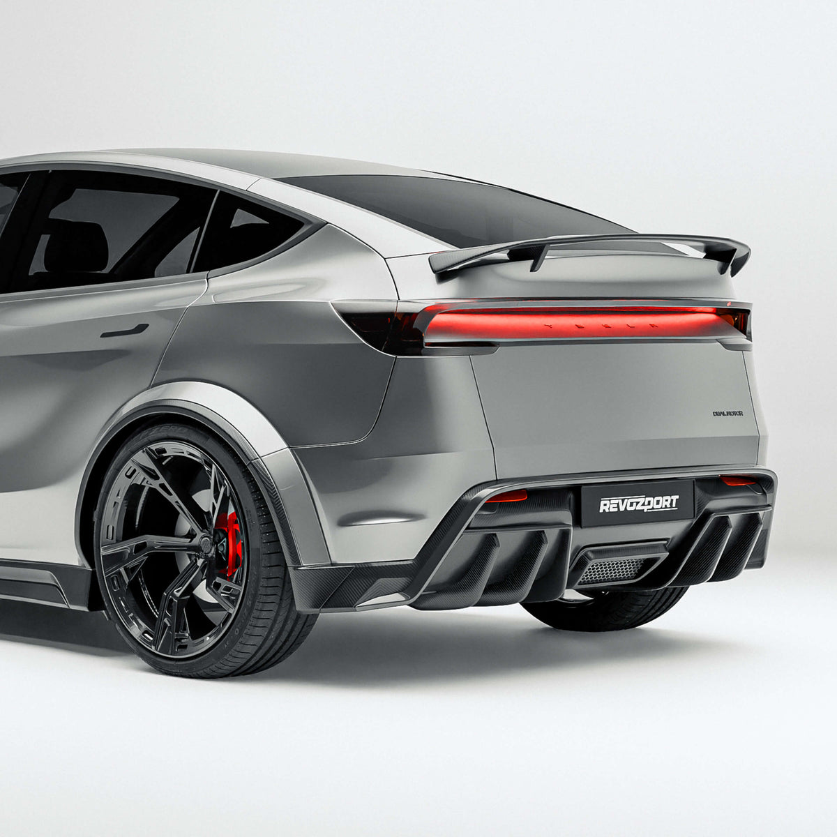 Tesla Model Y Juniper carbon fiber rear diffuser studio view